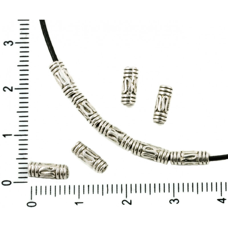 Kovové korálky stříbrný starožitný vzhled válečky zdobené vlnkami s velkou dírkou rozměry 8 mm x 3 mm 40 kusů