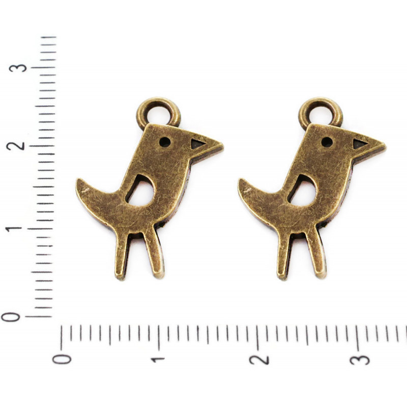 Kovový přívěsek ve tvaru ptáčka starožitný bronzový vzhled plochý, rozměry 22 mm x 12 mm dírka 2, 5 mm 4 kusy