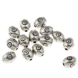 Kovové oválné korálky stříbrný starožitný vzhled zdobené, velikost 8 mm x 6 mm dírka 1 mm 20 kusů